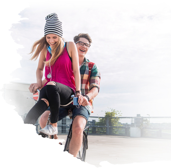 Guy and girl on bicycle
