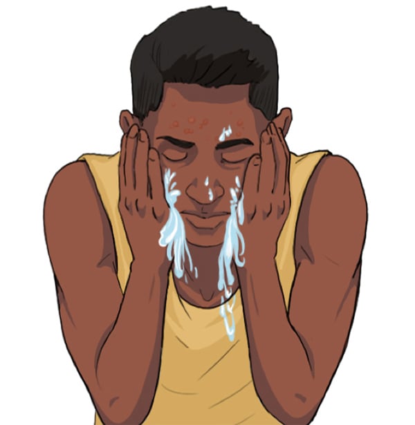 Guy washing face with water